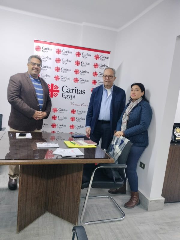 Directeur de Caritas et Sous-Directrice et un membre de l'ASE en visite